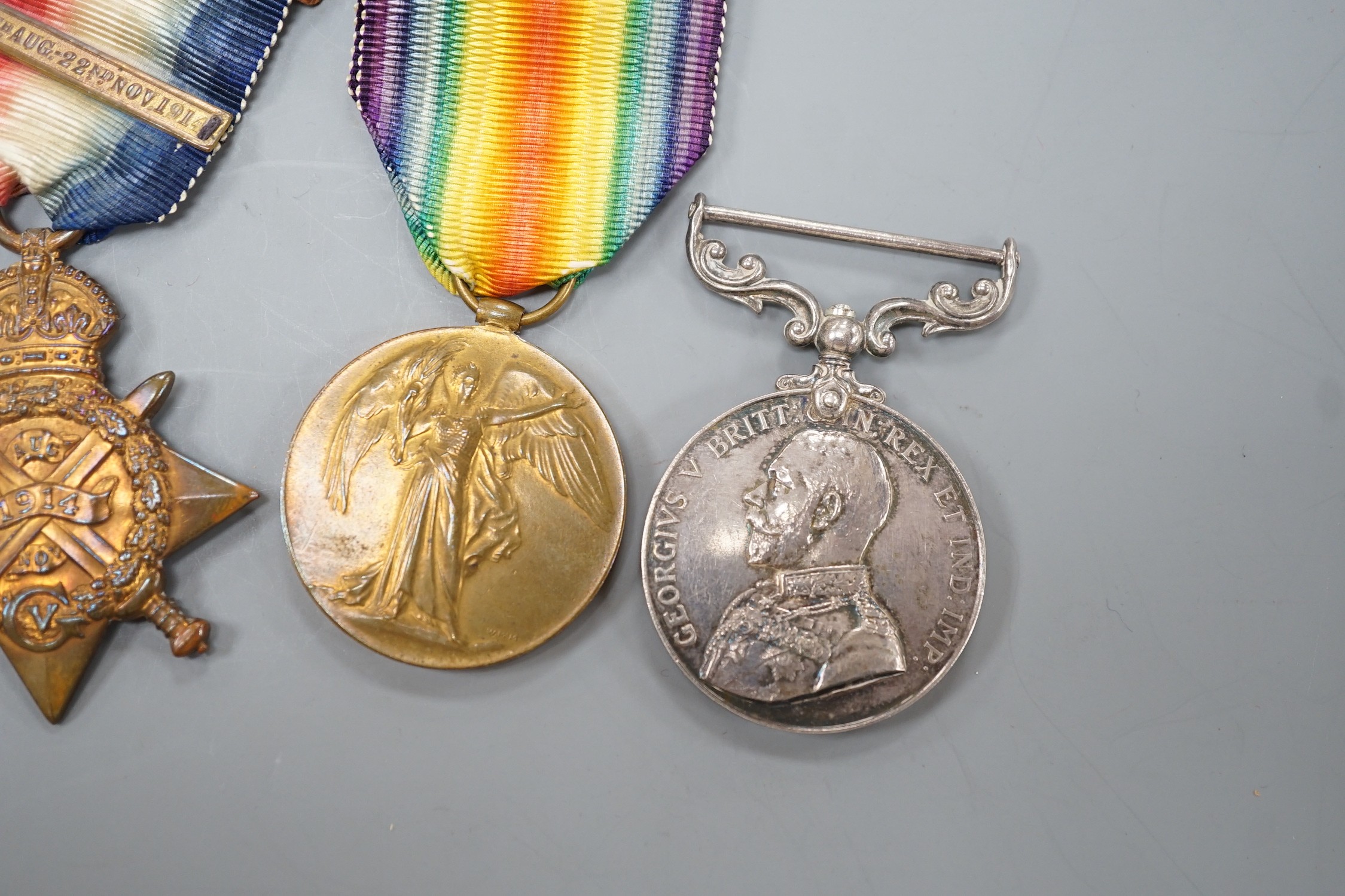 A WWI Mons star (with bar) pair, QSA with 4 clasps and LSGC to 11185 GNR. G.J. PARKER R.F.A. (4)